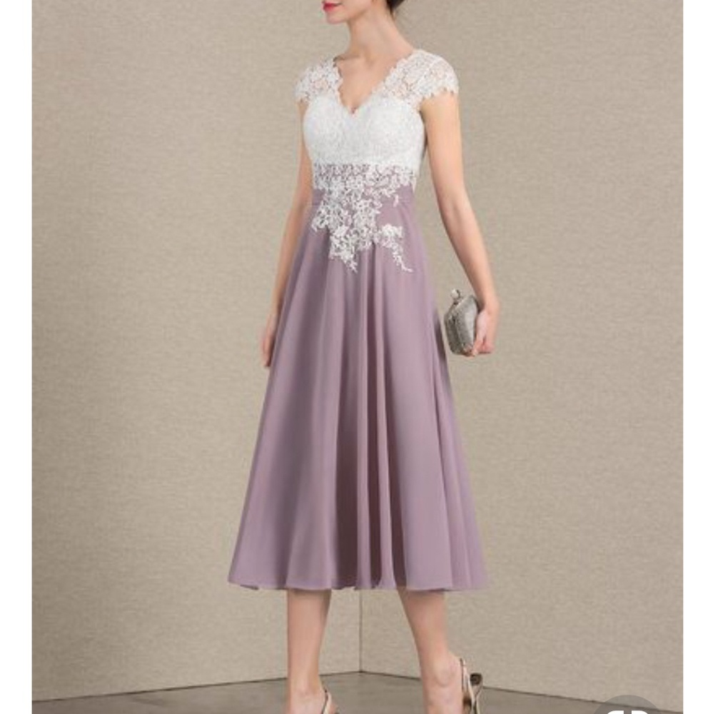 Mother of the bride dress never worn.